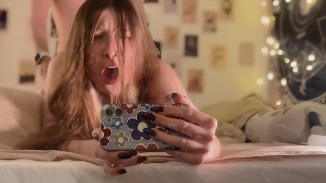 A stunning Russian teen with a tantalizing tattoo on her back gets a wild ride in this steamy video. Watch her pleasure and orgasm as a passionate lover takes her in doggy style, filling her pussy with his hot load.