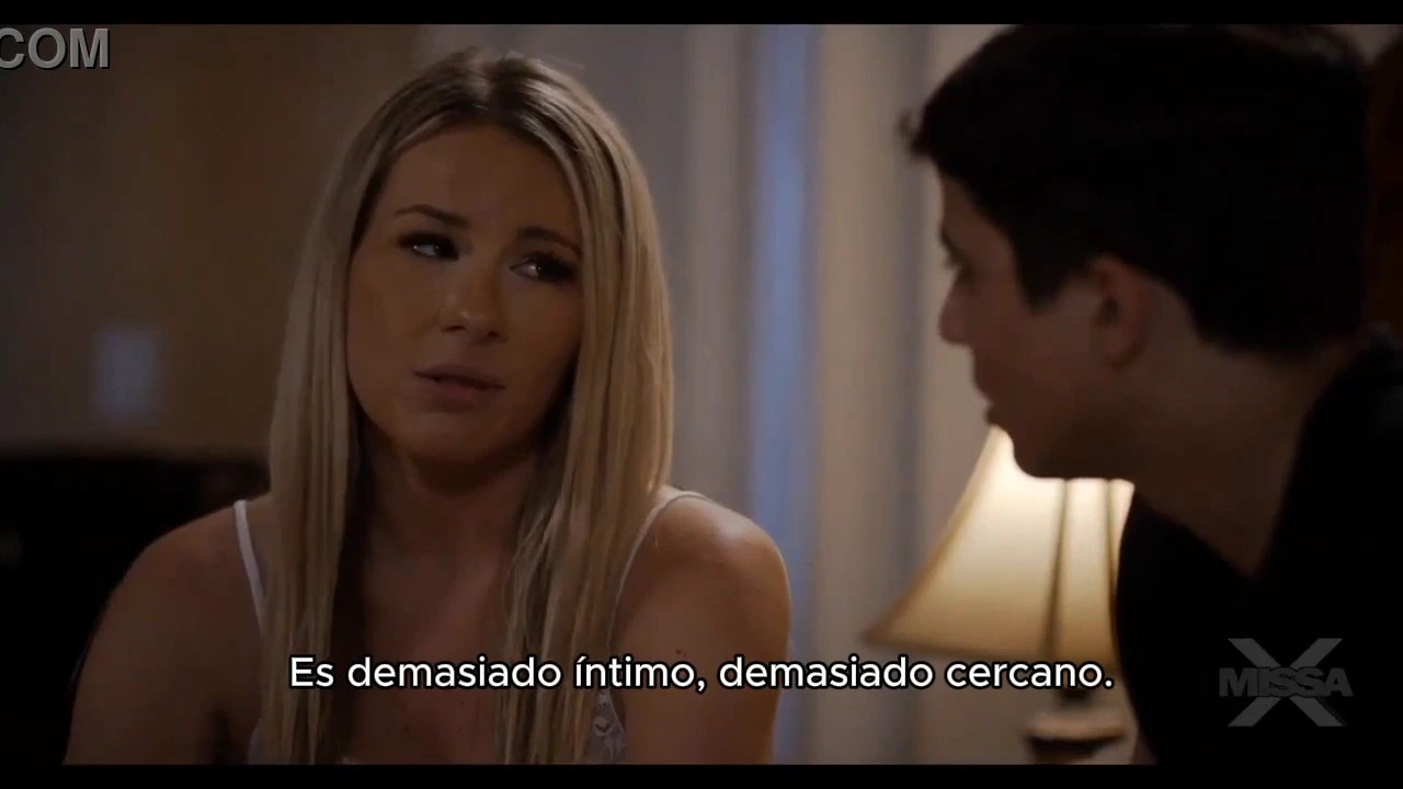 My stepmother is a hot blonde and she is always willing to please. See how she goes from being the perfect homemaker to a seductress in this full erotic scene in Spanish.